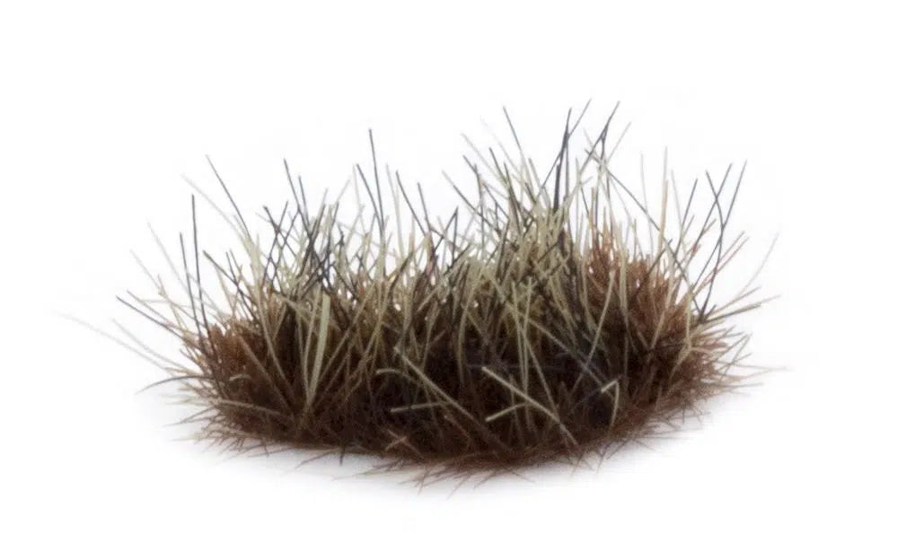 Macro detail of GamersGrass Burned 6mm tuft showing the dark base and beige tips