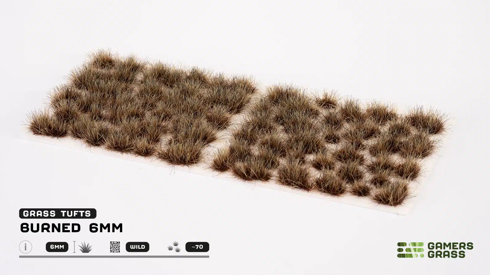 Full sheet of approximately 70 GamersGrass Burned 6mm self-adhesive tufts for scale modeling.