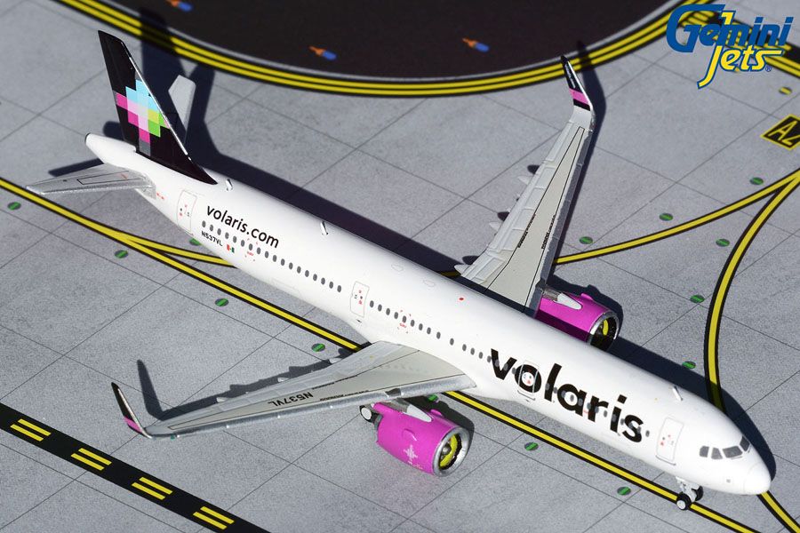 Top down angle of GeminiJets 1 by 400 scale Volaris Airbus A321neo diecast model N537VL parked on an airport diorama mat as captured in file
