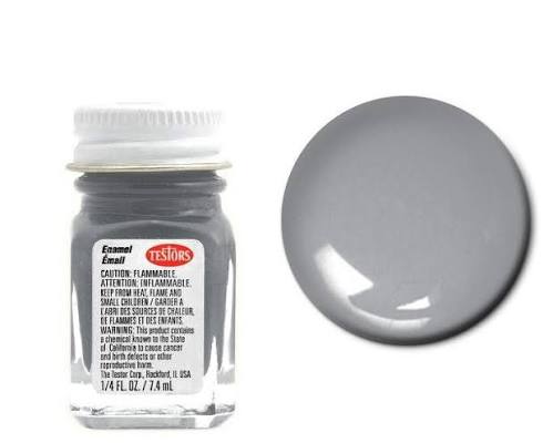 Testors Steel Flat Enamel Paint quarter ounce glass bottle next to a circular gray metallic color swatch displaying its smooth matte texture finish