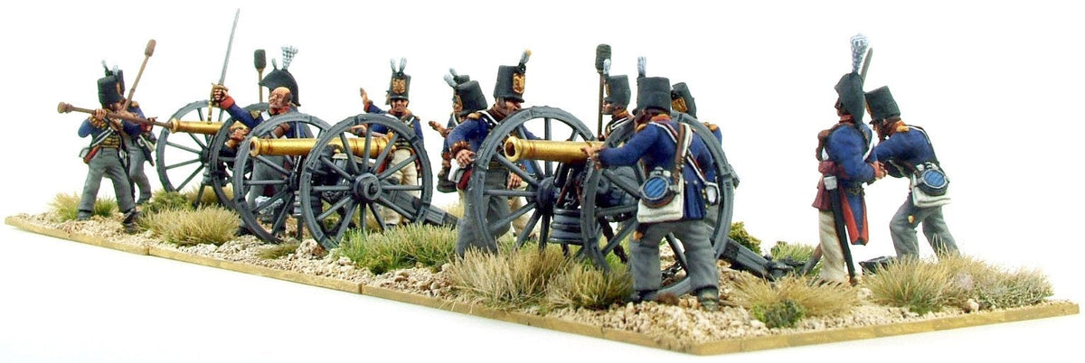 Front line view of three painted Victrix 28mm British foot artillery guns and operating crew