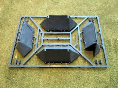 Gray hard plastic sprue frame for the Renedra Saxon Tents kit displaying component halves for open and closed medieval tents