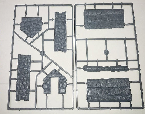 Two-frame hard plastic sprue set for the Renedra Stone Thatched Outbuilding showing roof and stone wall components.