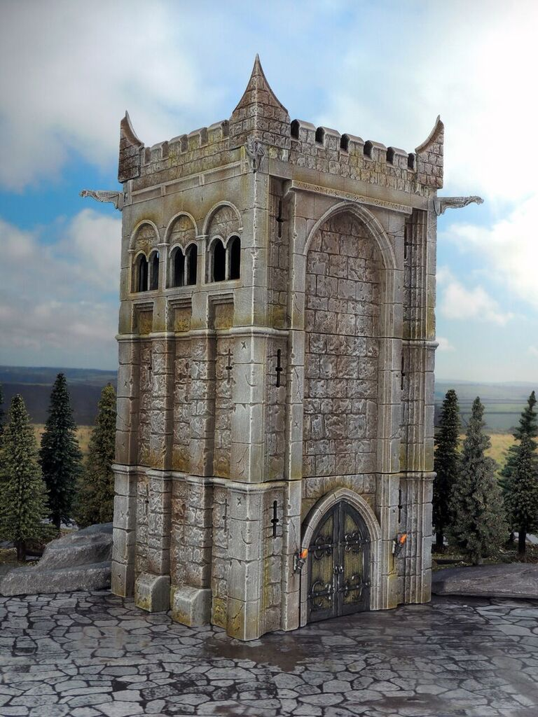 Fully assembled and painted 28mm scale Renedra stone watchtower featuring arched windows, crenellations, and gargoyles on a scenic terrain board