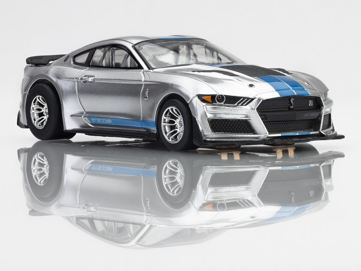 AFX Racing 2022 Mustang Shelby GT500KR 1:64 scale HO slot car in silver with blue stripes and rear wing