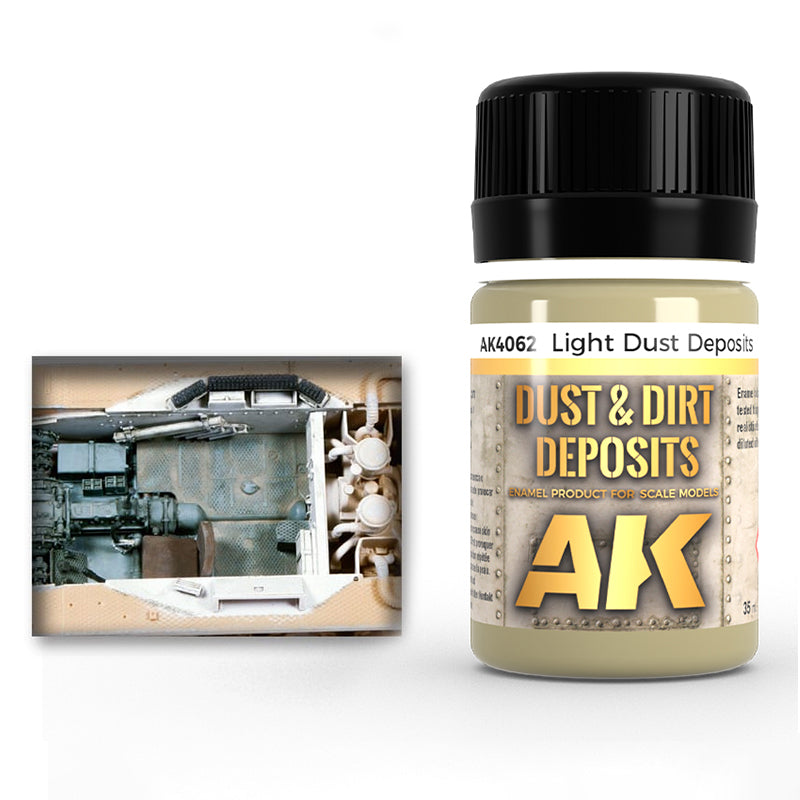 AK Interactive Light Dust Deposits AK4062 35ml jar next to an open-top interior model compartment showing dust accumulation.