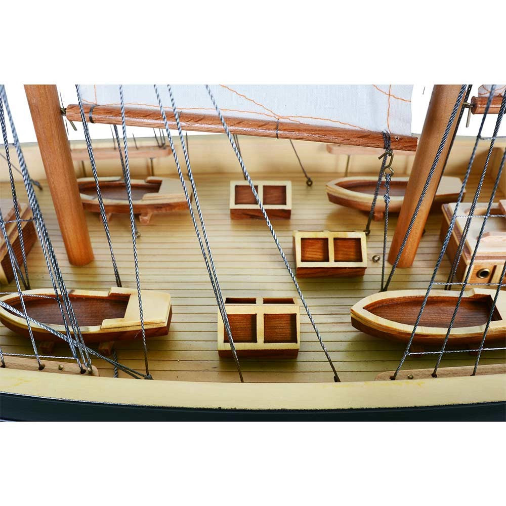 Captain Heritage Atlantic Painted Large Sailboat Schooner Yacht, detailing the miniature wooden lifeboats, skylights, and rigging lines.