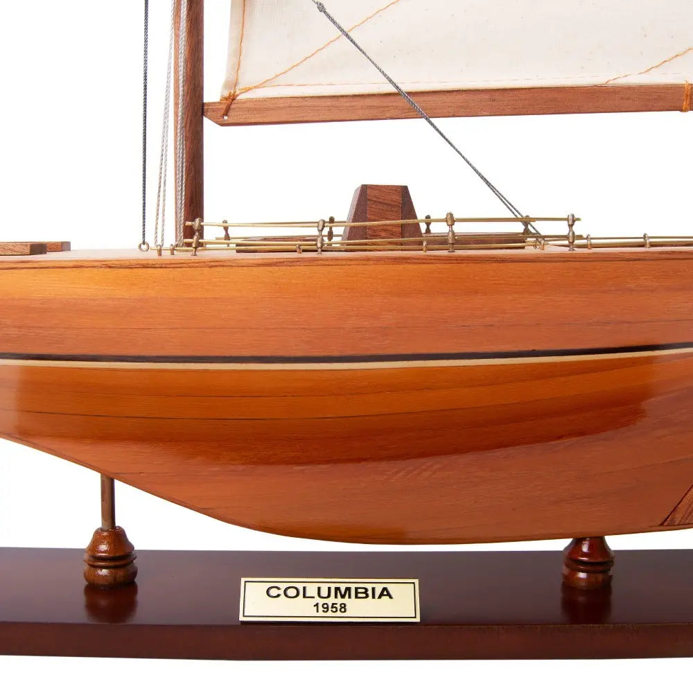 Wooden display base with brass nameplate for Columbia 1958 model