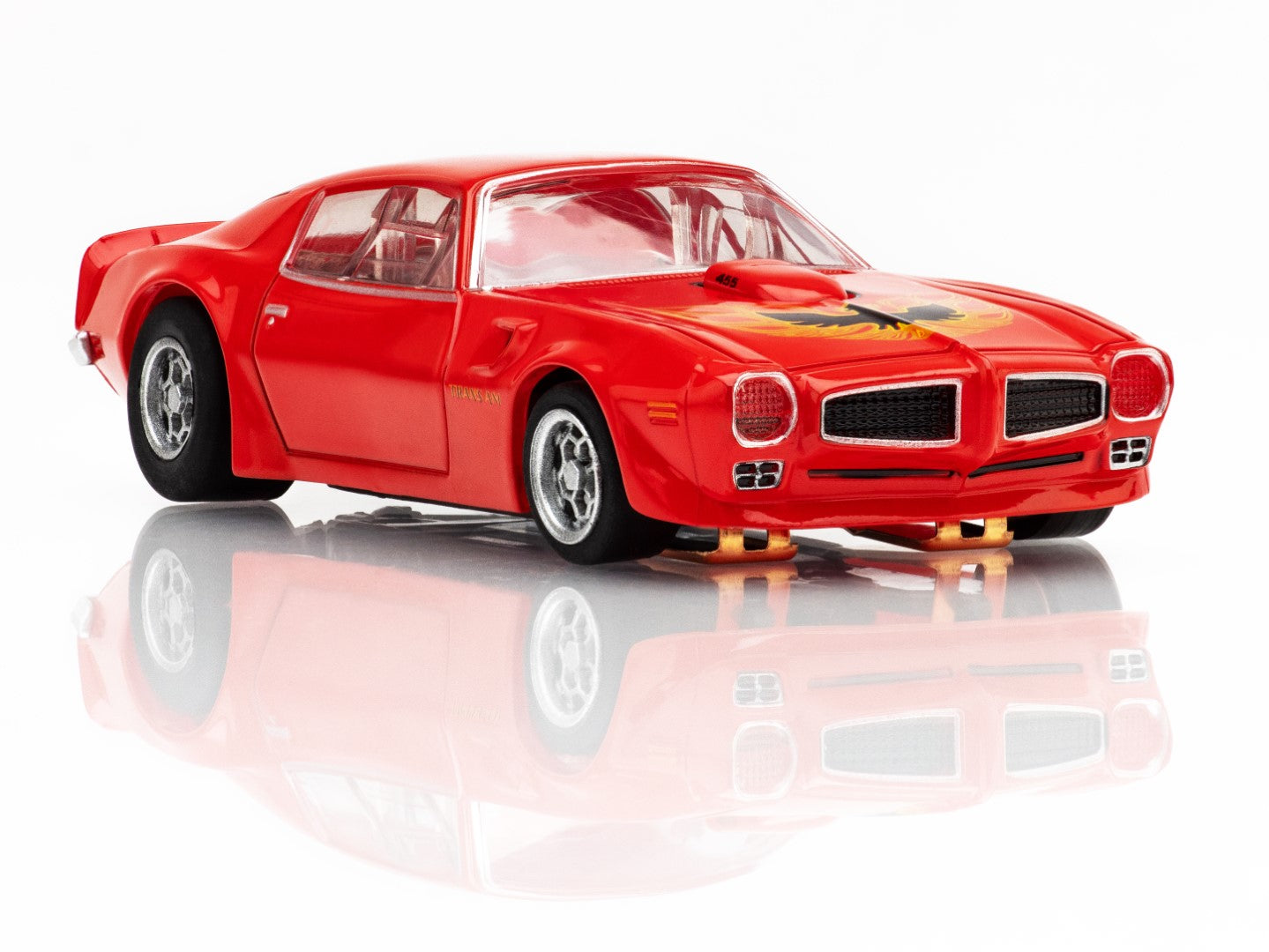 Right Front  profile view of the red AFX 1973 Firebird Trans Am slot car highlighting the Honeycomb wheels and wide body.