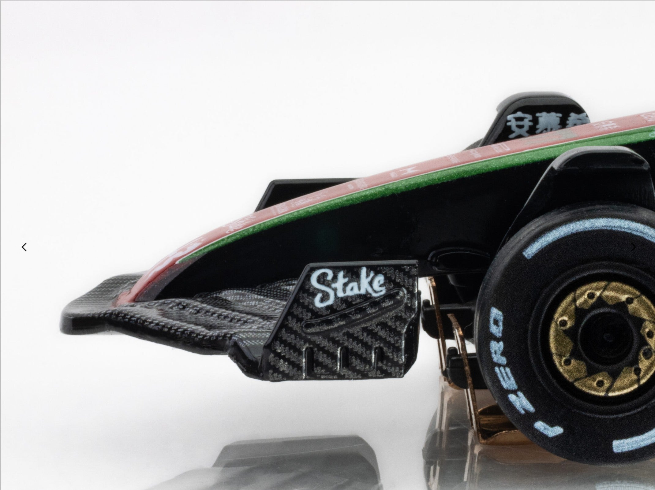 Macro closeup of front wing on the AFX 2023 Alfa Romeo F1 slot car