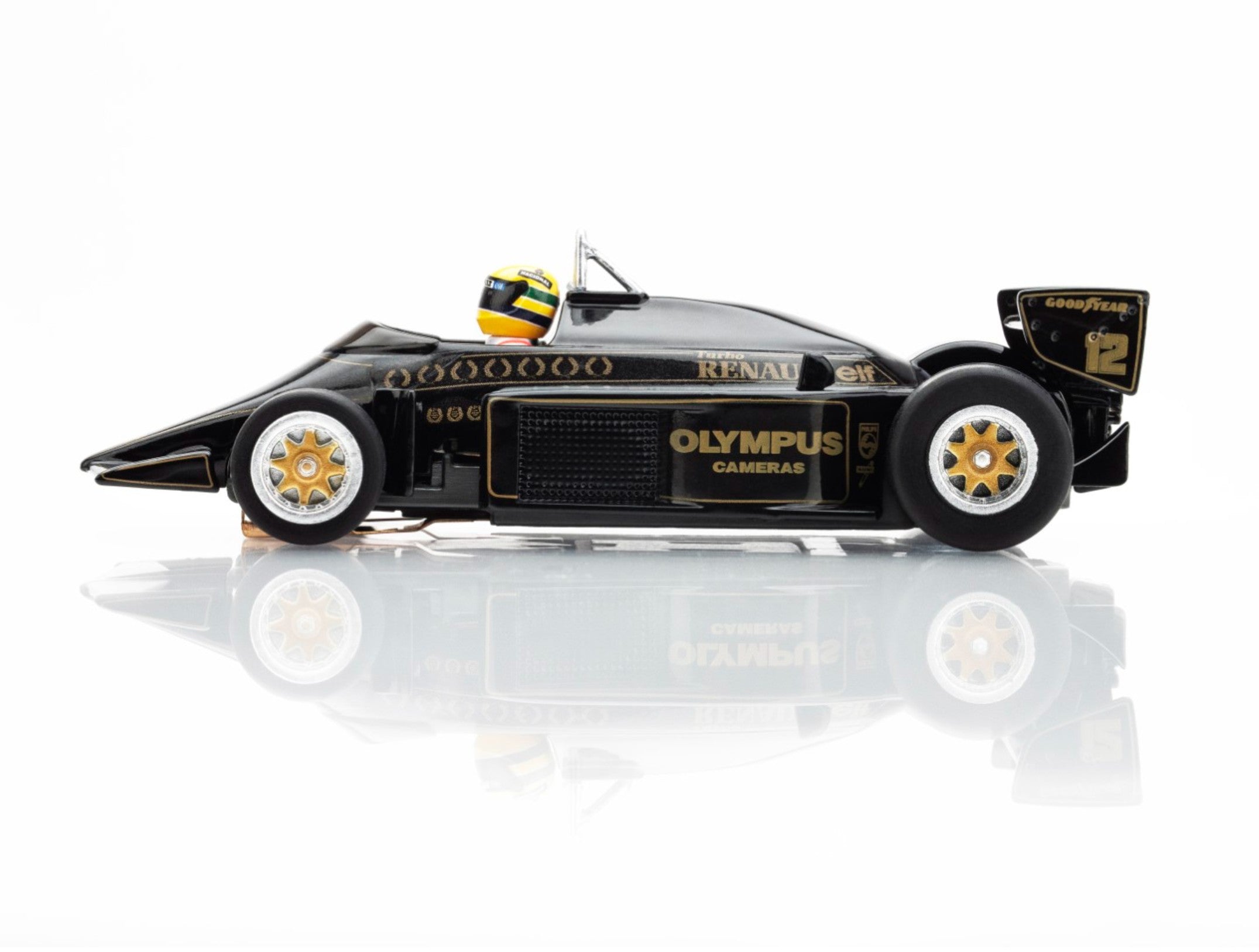 Side profile of the AFX Lotus 97T black and gold F1 car highlighting the Mega G+ long wheelbase chassis.