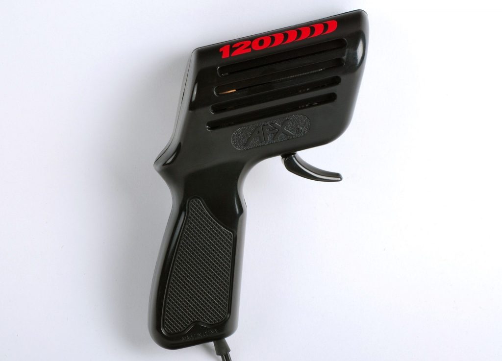 Black AFX 120 Ohm slot car controller featuring red branding and an ergonomic trigger design.