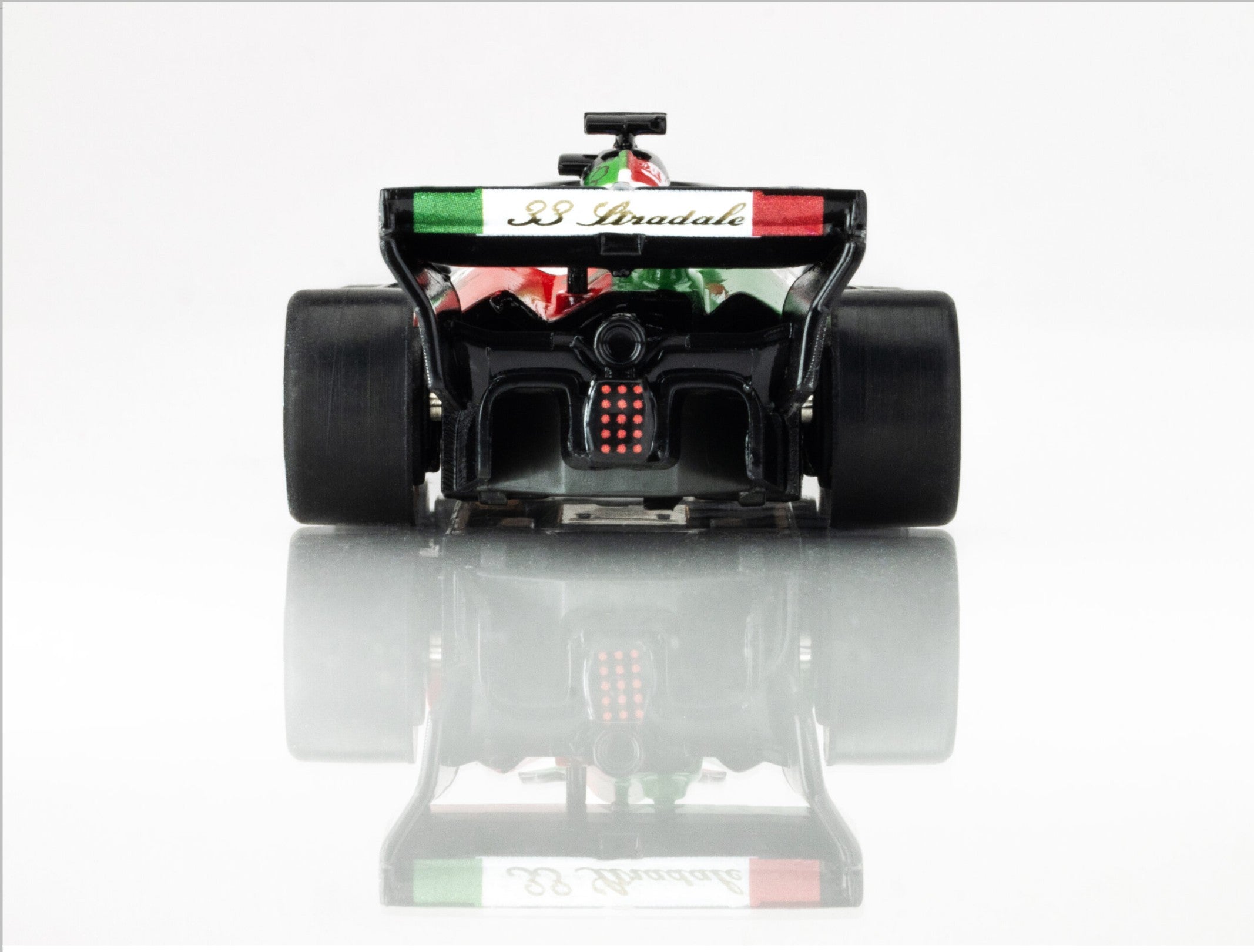 Rear view of AFX 2023 Alfa Romeo F1 Monza car showing  aero detailing.