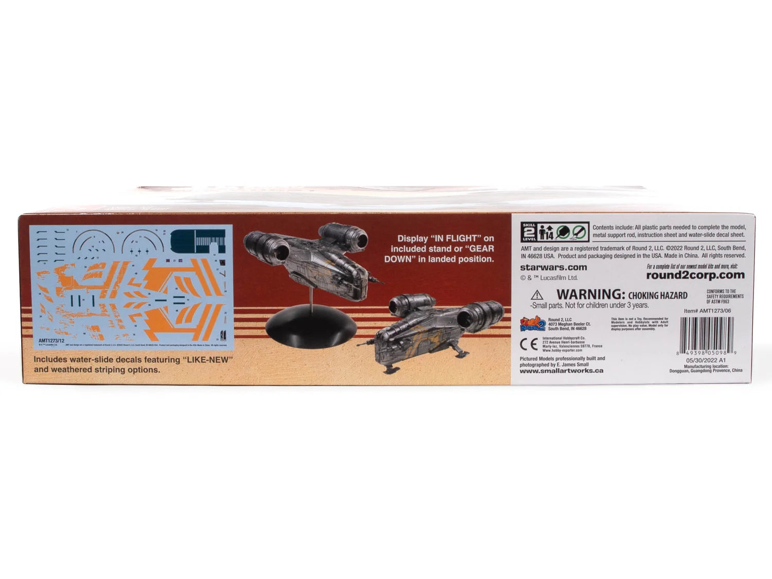 Side panel of AMT Razor Crest box showing decals and gear options