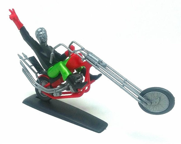 Assembled and snapped-together red and silver 1/32 scale Roar'N Peace chopper motorcycle model with rider figure on a display base.
