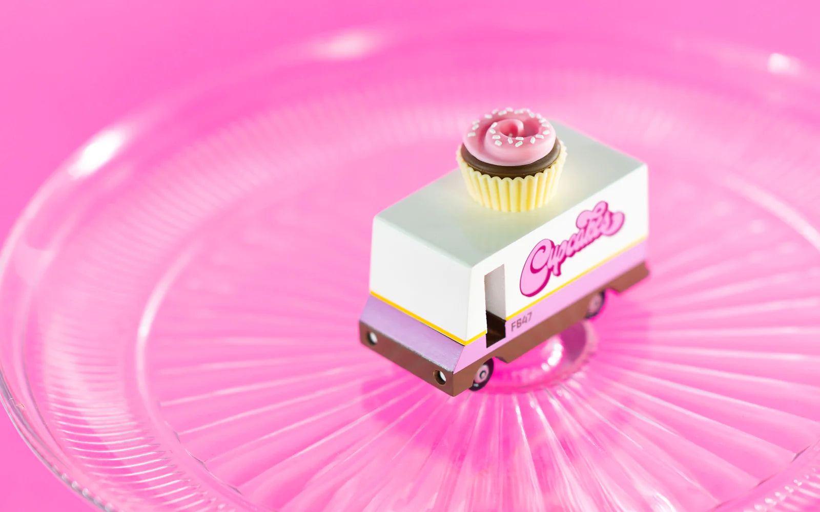Candylab Toys Cupcake Van – Displayed on Glass Platter with Pink Background