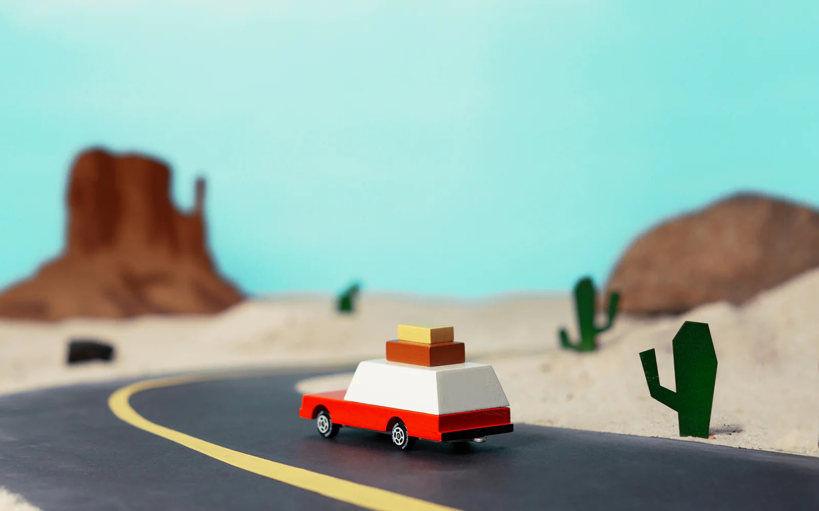 Candylab Toys Luggage Wagon Wooden Vehicle – Lifestyle Scene on Desert Road