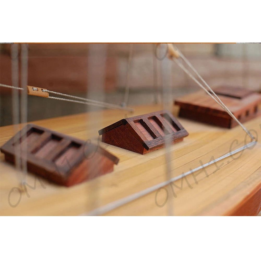 Captain Heritage Defender Sailboat Schooner Yacht, showing close-up details of the wooden deckhouses, planking, and rigging lines.