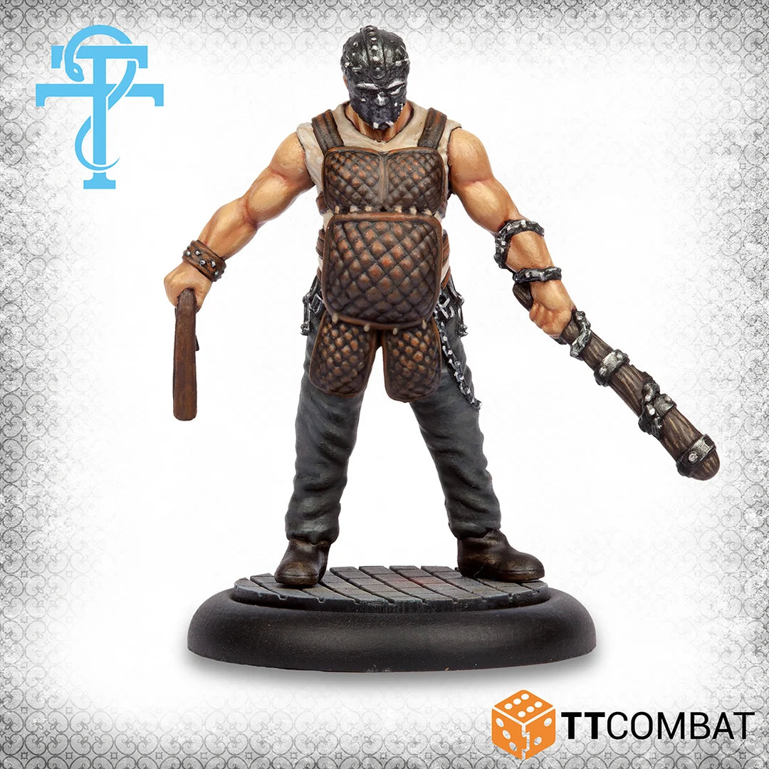 Studio painted model of the Warden miniature wearing a metal mask and holding a leather whip and wooden club