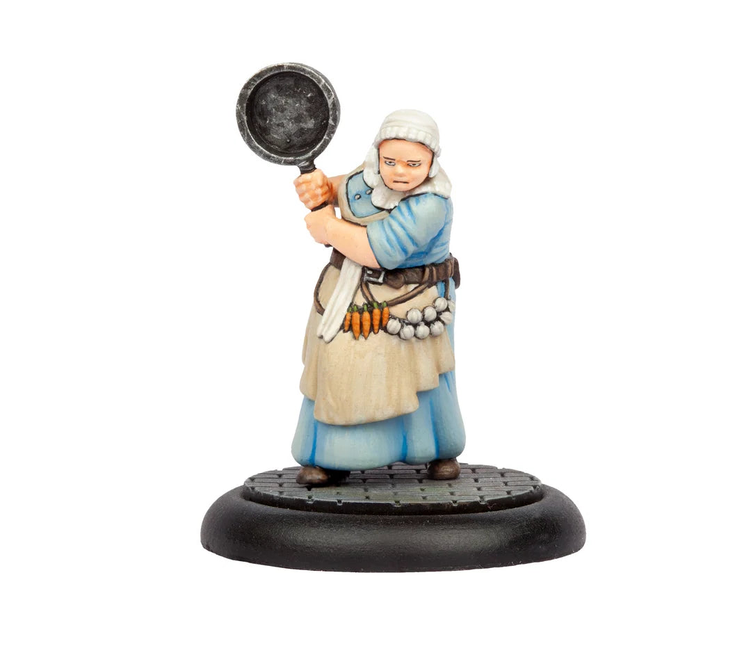 Painted model of a Household Staff maid miniature holding a frying pan in a two handed combat stance