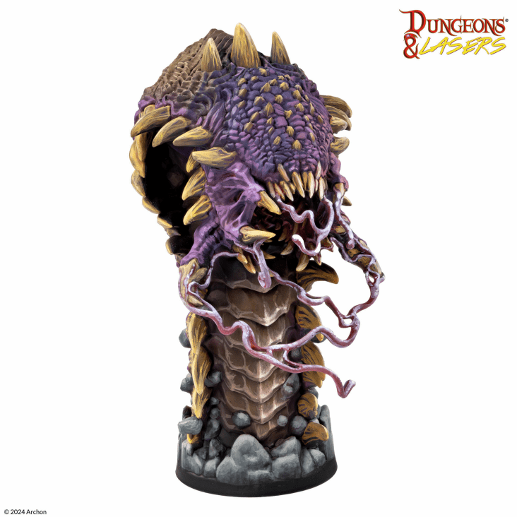 Fully assembled and painted example of the Sandwyrm miniature showing purple back scales yellow side spikes and a rocky 50mm base