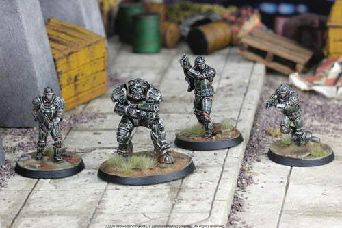 Studio-painted Brotherhood of Steel Frontline Knights miniatures advancing through ruined urban terrain