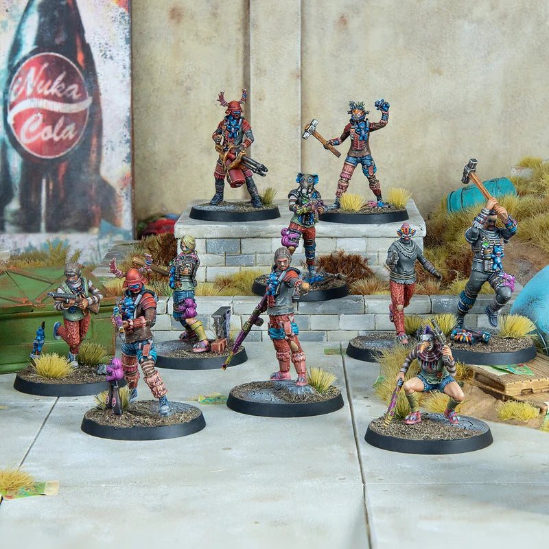 Modiphius The Pack raider miniatures in a narrative Nuka-Cola tabletop battle scene.