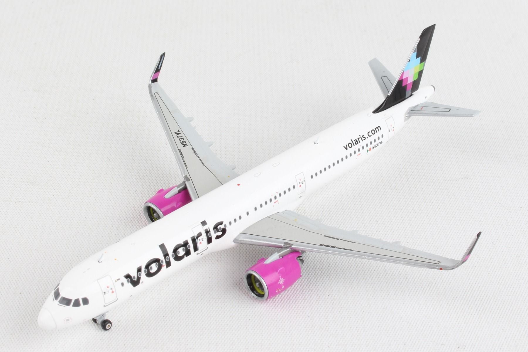 Elevated left front view of GeminiJets 1 by 400 scale Volaris Airbus A321neo diecast airplane 