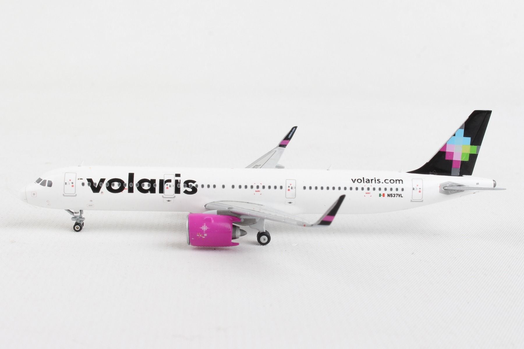 Left side profile view of GeminiJets 1 by 400 scale Volaris Airbus A321neo diecast model aircraft 