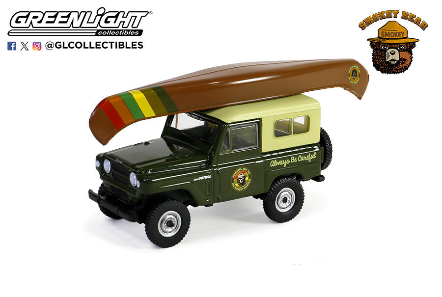 Greenlight Smokey Bear Series 3 1980 Nissan Patrol with canoe 1/64 diecast