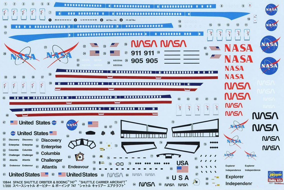 High-resolution view of the waterslide decal sheet featuring NASA logos, cockpit windows, blue livery stripes, and individual Orbiter nameplates like Atlantis and Discovery.