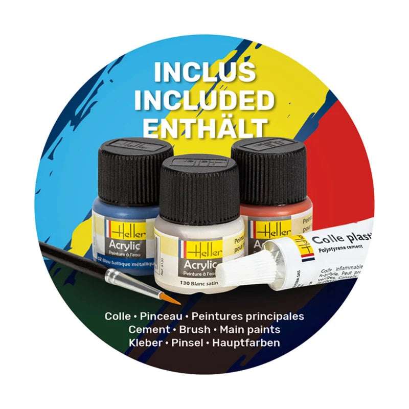 Close-up view of included acrylic paint pots, brush, and plastic cement inside Heller starter set.