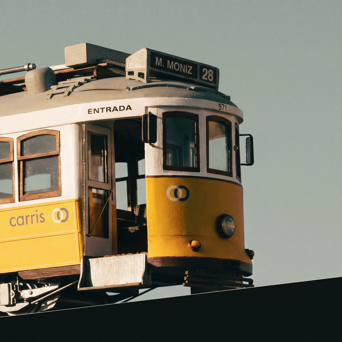 Close up of the front entrance door, windshield glass, and headlamp on the Occre Lisboa tram model 