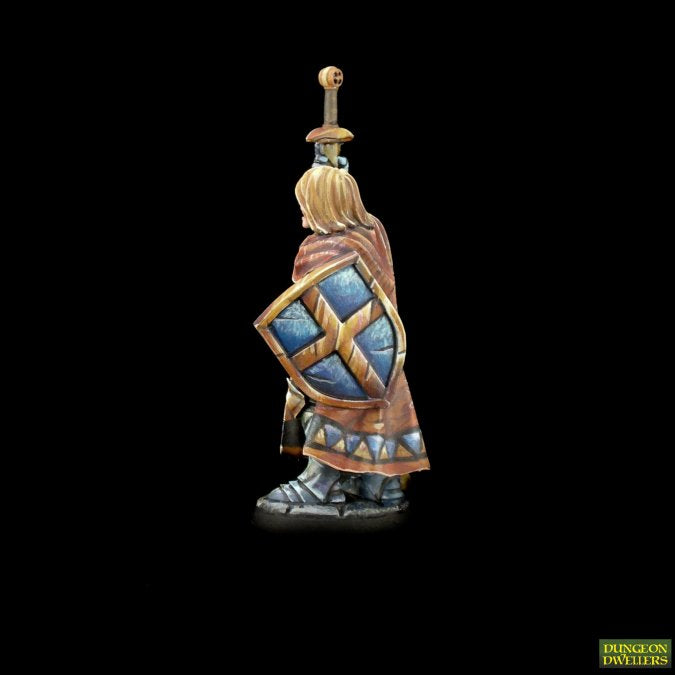 Side angle view of painted Sir Danarel The Holy miniature showing painted kite shield pattern in 28mm scale. 