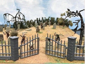 Fully assembled and painted 28mm scale Renedra iron railings and stone pillars forming a gated entryway into a haunted graveyard diorama