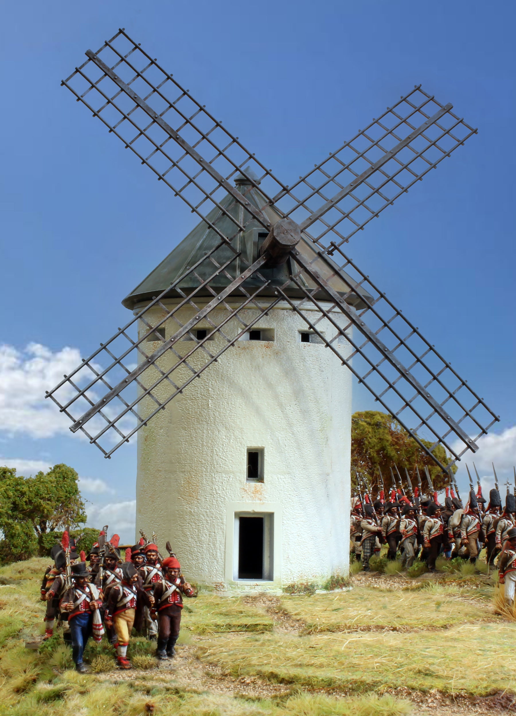 Fully assembled and painted Renedra Windmill featuring rotating sails and 28mm Napoleonic infantry figures