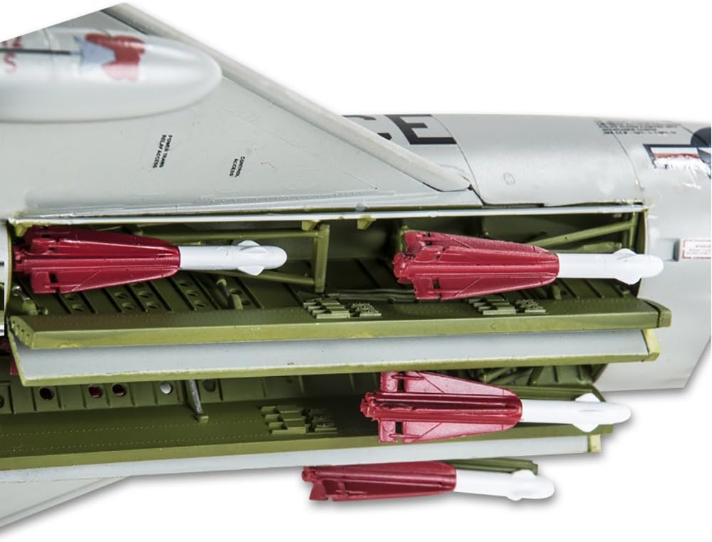 Close-up view of open weapons bay with AIM-4 Falcon missiles on deployable trapeze launch rails.