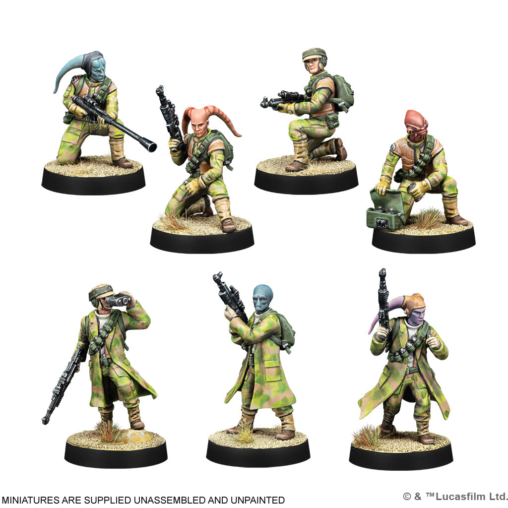 Seven assembled Rebel Commando miniatures in multi-terrain camouflage including alien species sculpts.