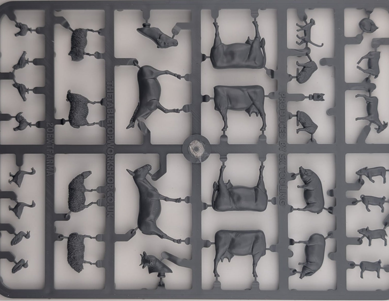 Tabletop Workshop 1/72 scale farm animal sprue showing 20 hard plastic animals