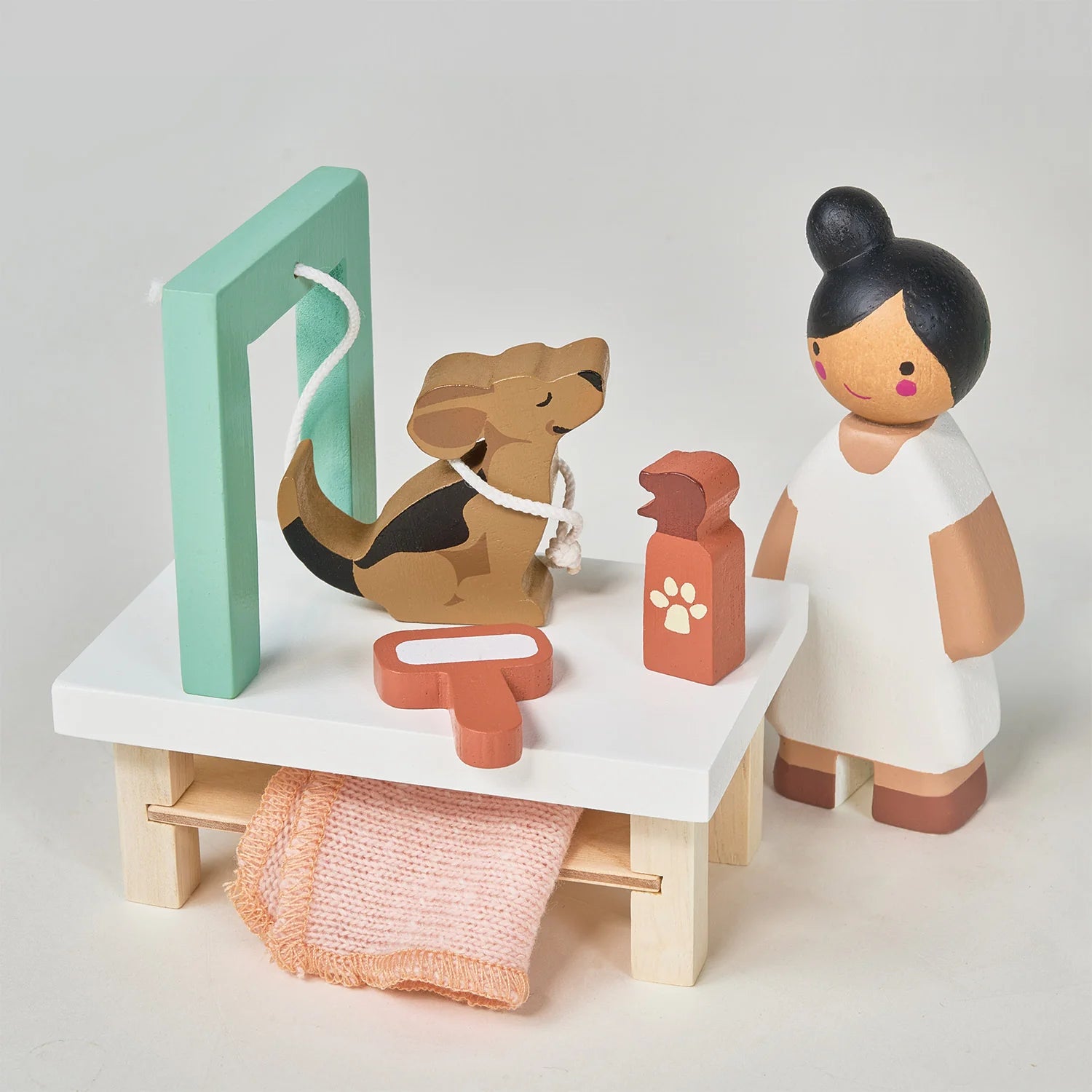Grooming table, hair dryer, and clippers detail