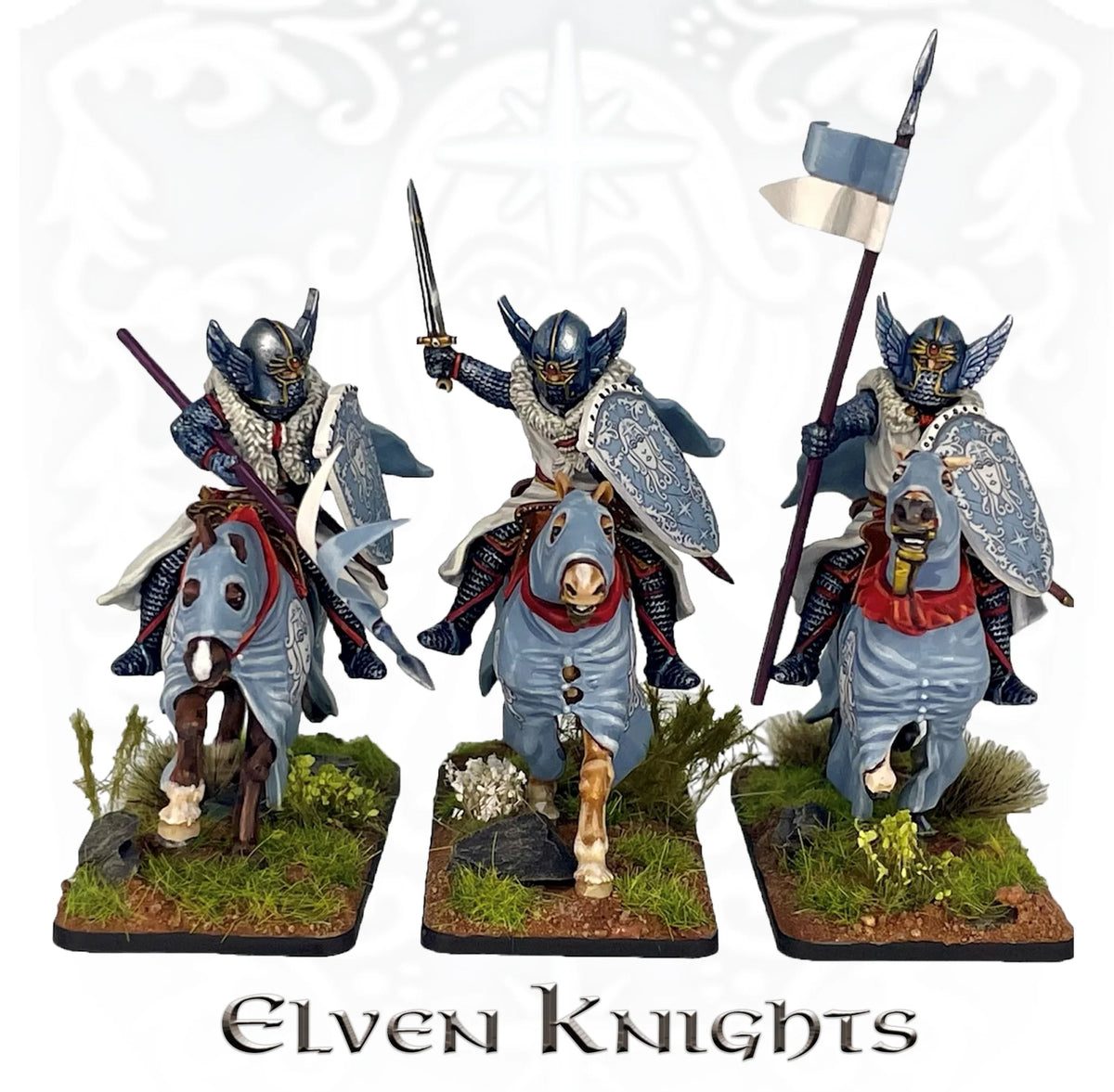 Three painted Victrix 28mm fantasy elven knights with winged helmets heater shields and barded horses 