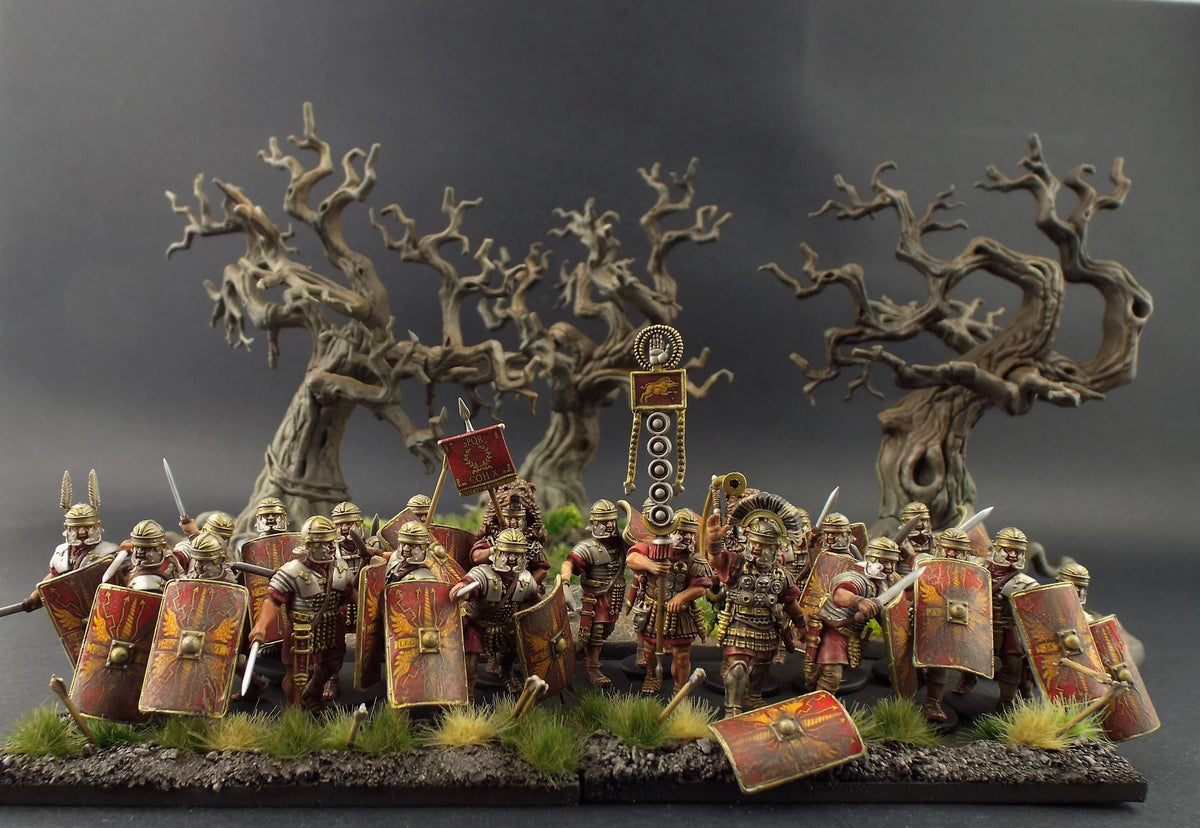 Painted Victrix 28mm Imperial Roman legionaries advancing in formation in a woodland diorama 