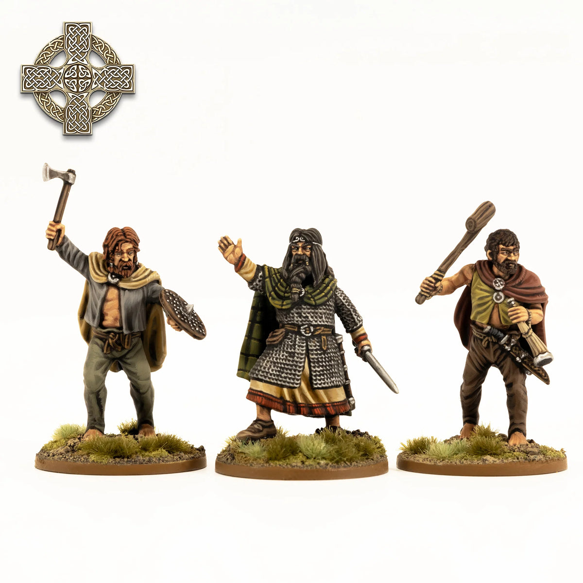 Three painted Victrix 28mm Irish figures showing armored chieftain warrior with axe and man with war club 