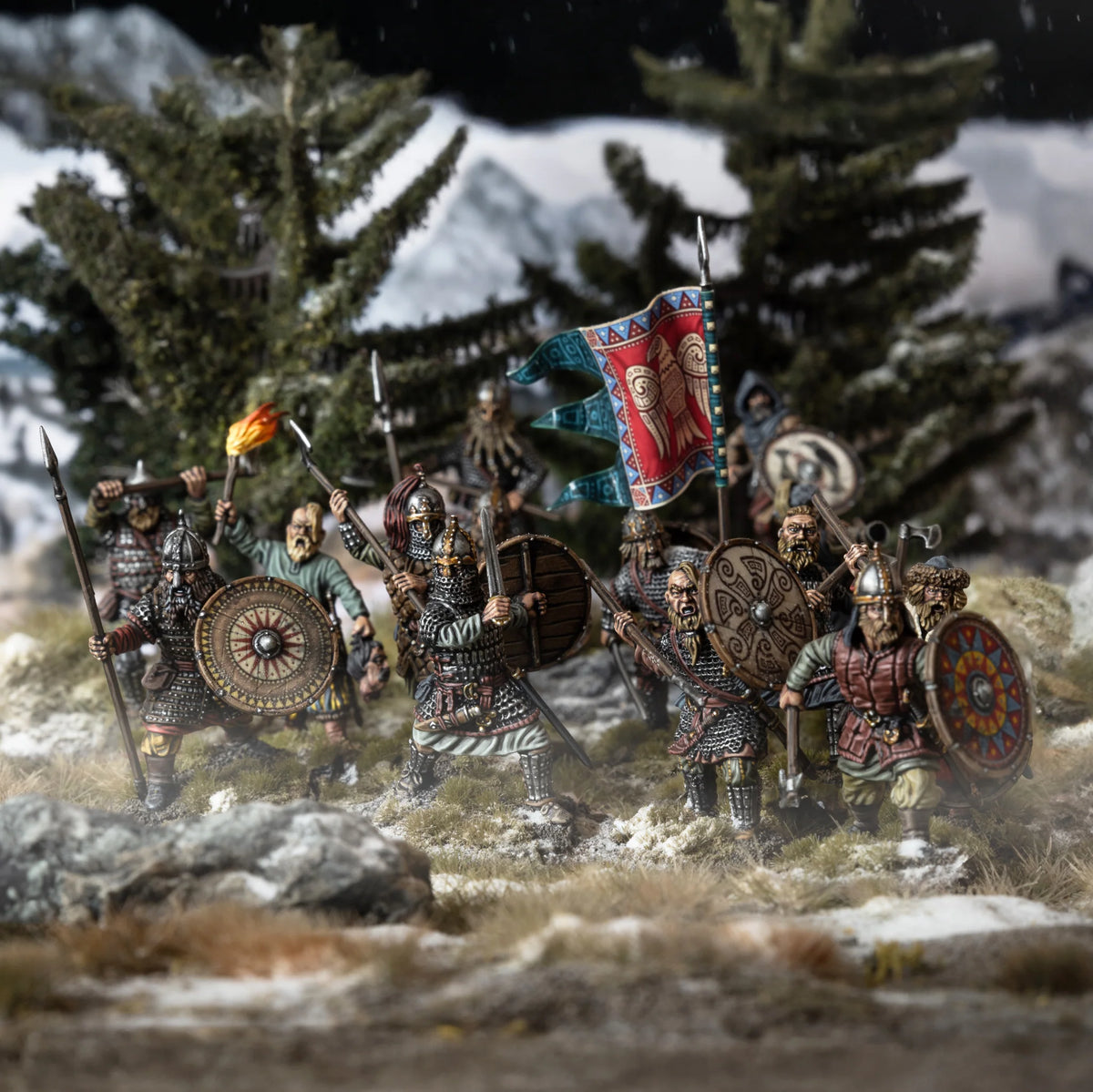 Scenic winter battle scene showing painted Victrix 28mm Rus infantry advancing with banner and round shields 