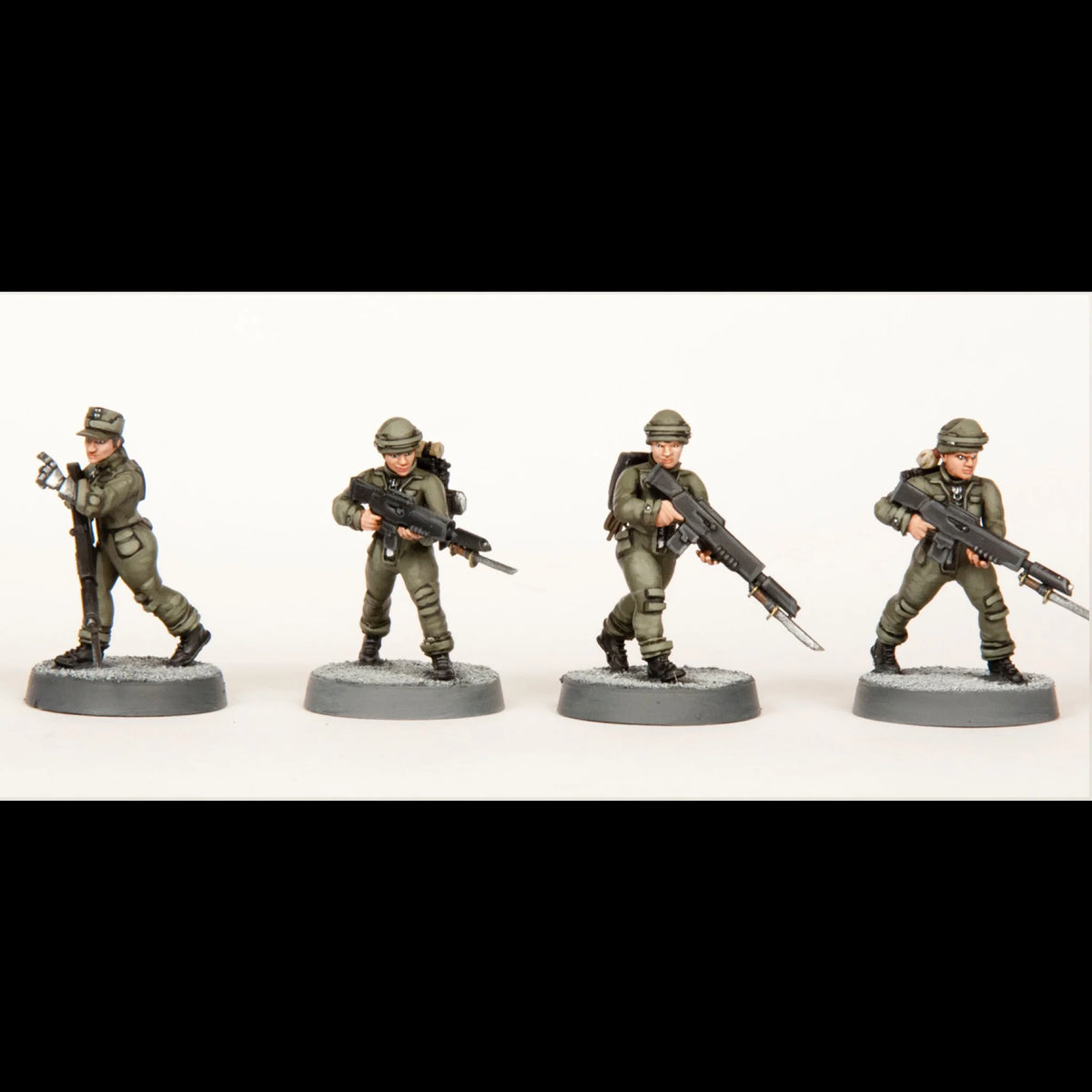 Line of four painted female militia troopers in olive green uniforms advancing with rifles