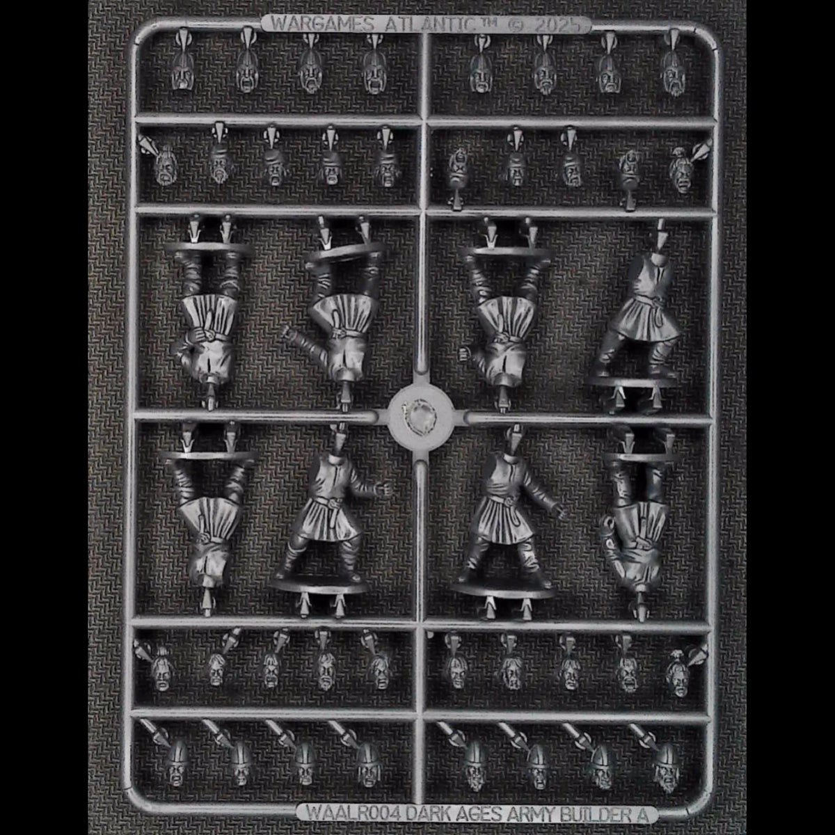 Front view of component sprue frame A showing unarmored warrior bodies and modular heads 