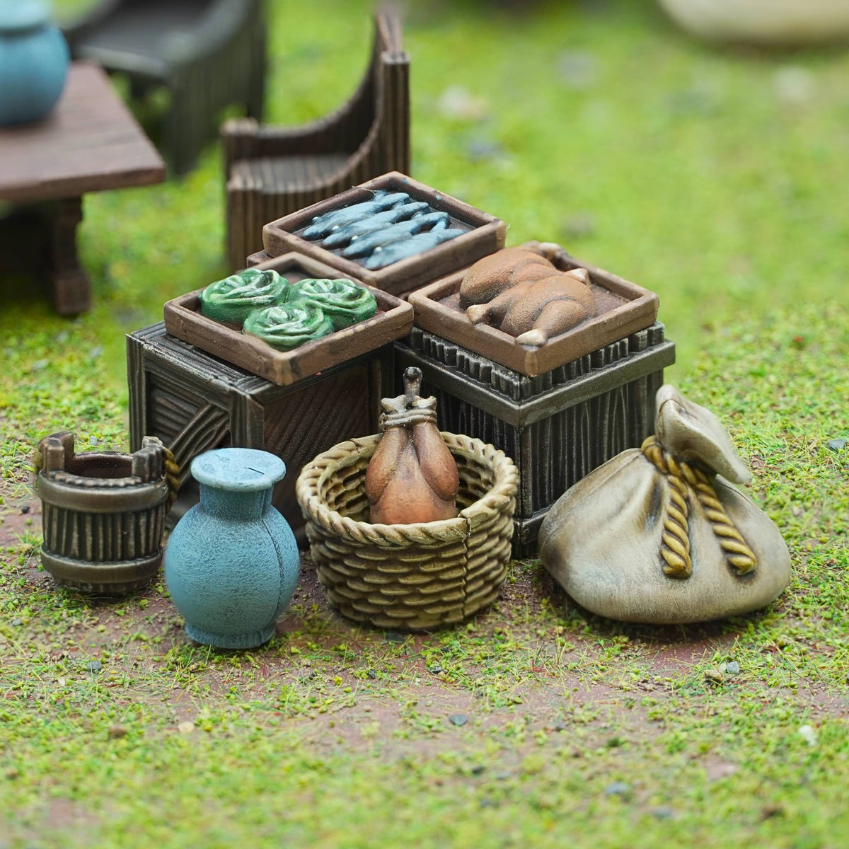 Painted 28mm marketplace food scatter including fish crates, roasted chicken, cabbages, and grain sacks 