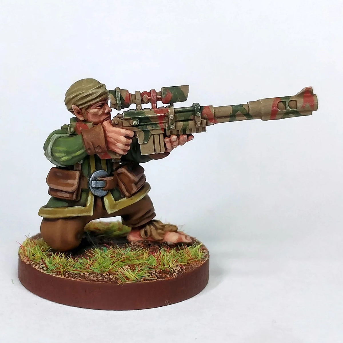 Painted SneakFeet sniper miniature kneeling with camouflage scoped rifle