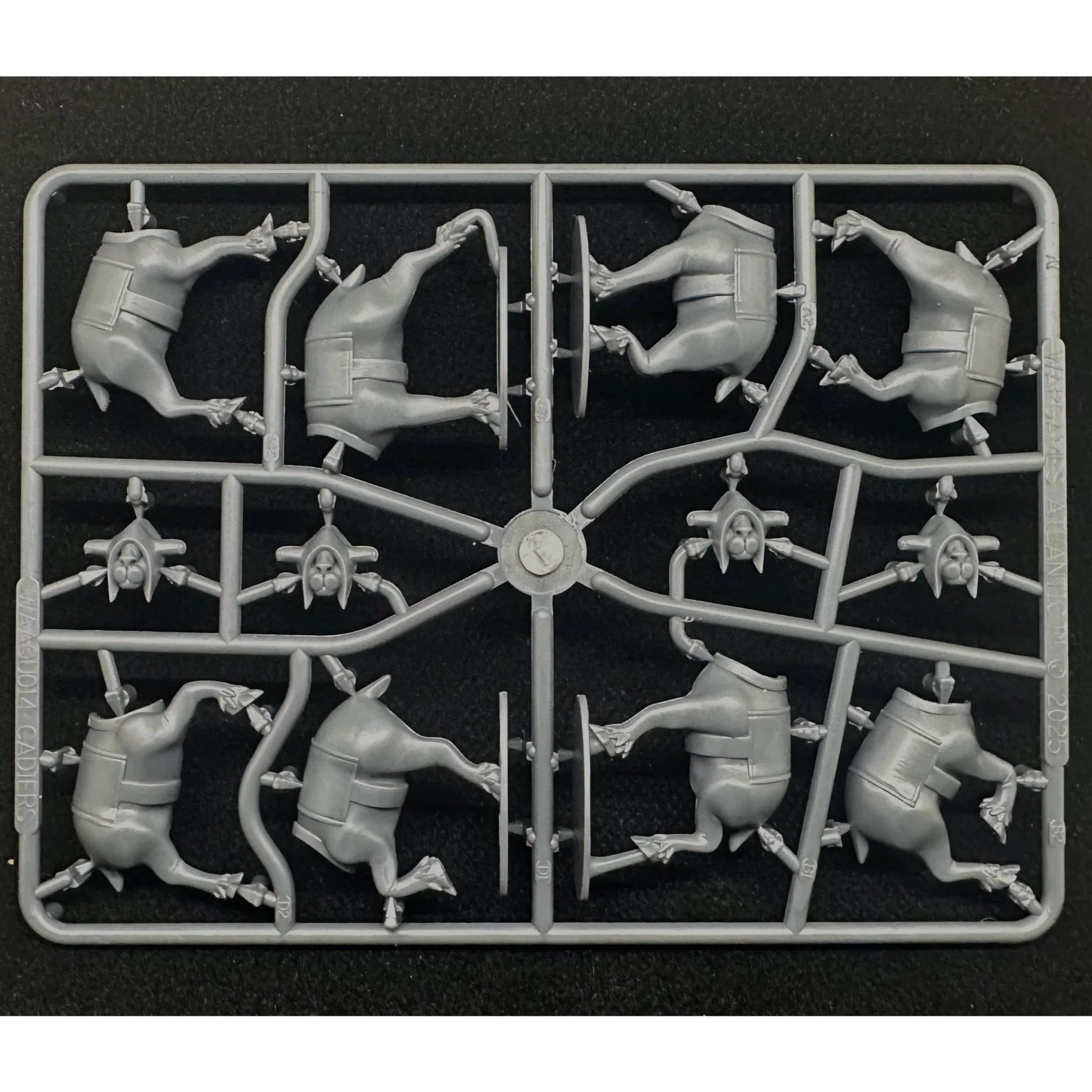 Gray plastic component sprue containing multi-part assembly components for four Cadier steeds