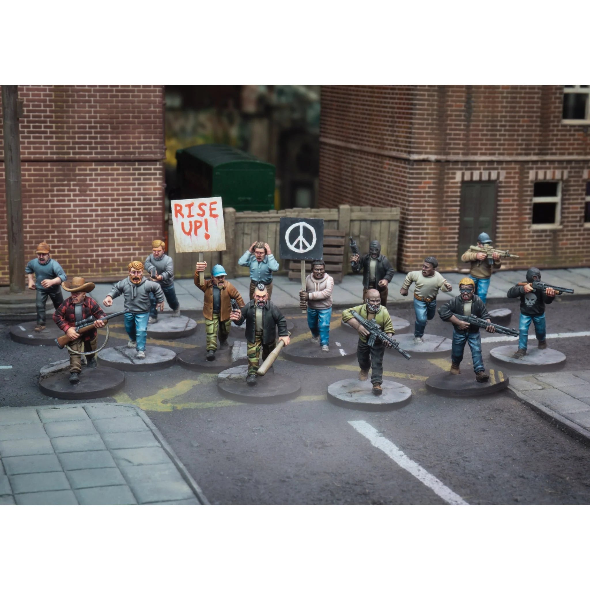 Full collection of painted 28mm modern survivor miniatures deployed on a city street layout